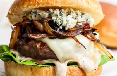 Bison Burgers Topped with Bacon and Cheddar