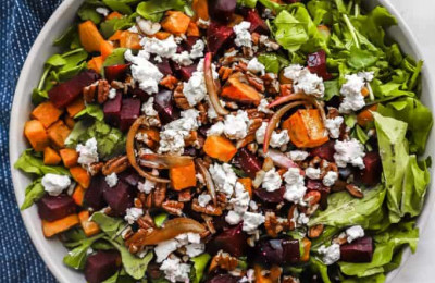 Salad Featuring Roasted Sweet Potatoes, Beet Noodles, Goat Cheese, and Pistachio Vinaigrette
